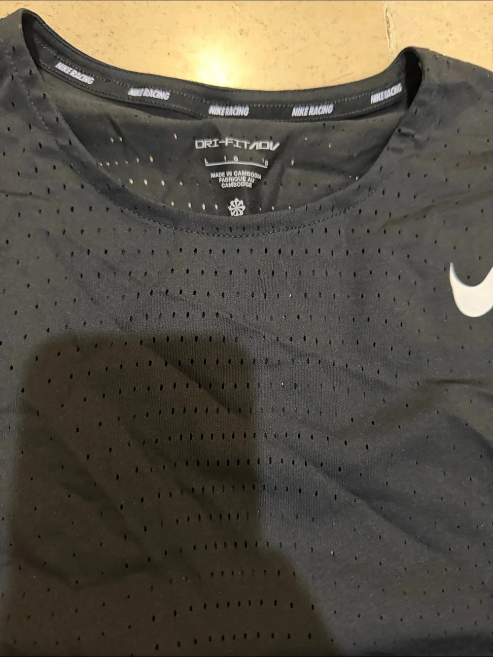 Nike Black Short Sleeve Performance Tee with White Swoosh
